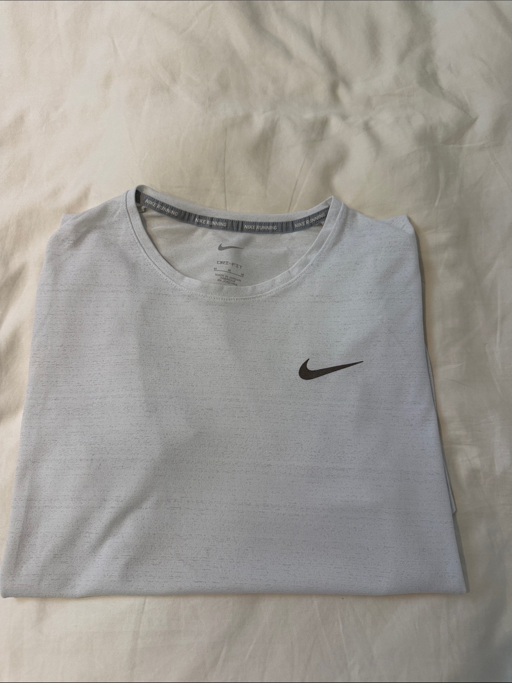 Nike Men’s White Short Sleeve Dri-FIT Tee with Black Swoosh